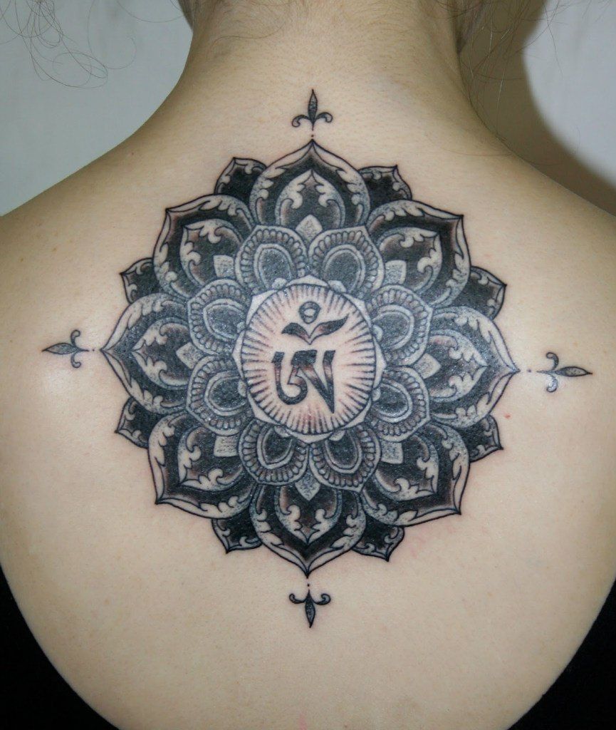 Mandalas tattooed on the back for women