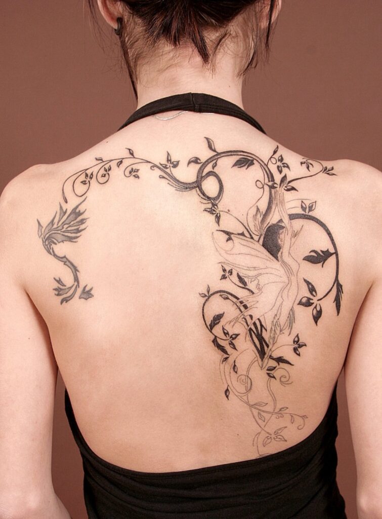 Tattoo of a girl on the back for women