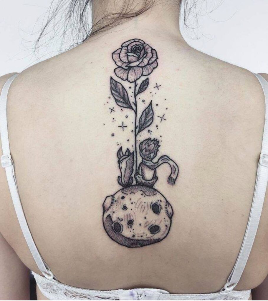 Tattoo of a little prince on the back for women