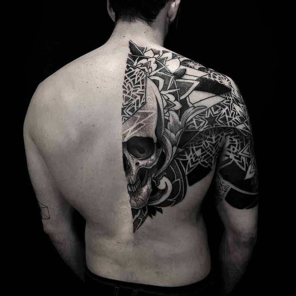 Skull tattoo on the back for men