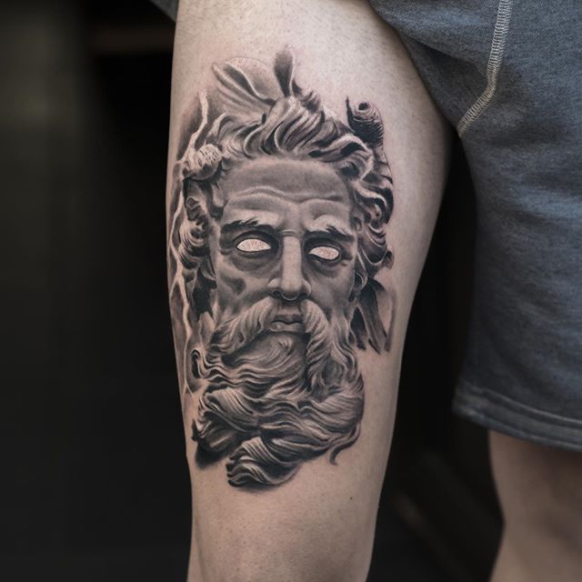 Large Poseidon tattoo on the thigh for men