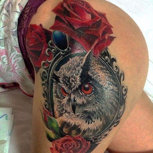 Colorful owl and two roses tattoo on the hip for women