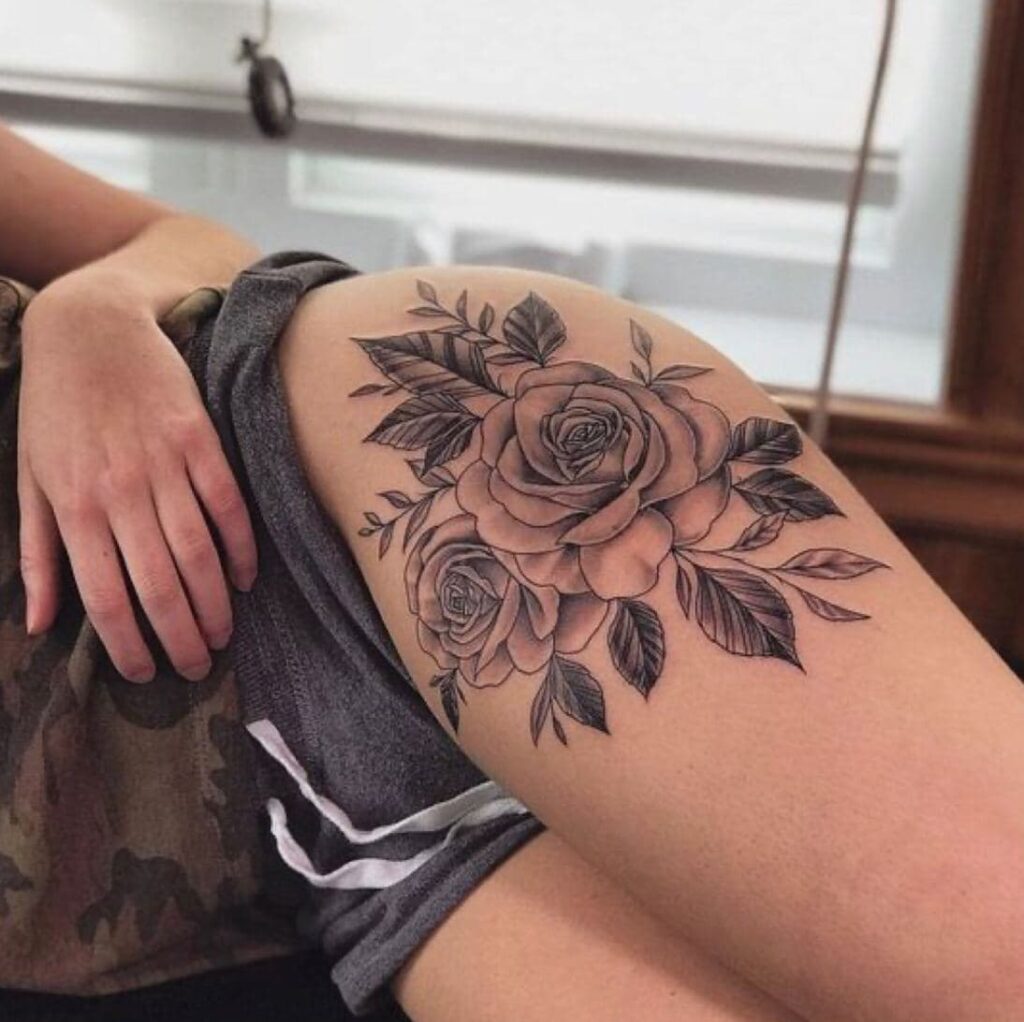 Tattoo of roses on the hip for women