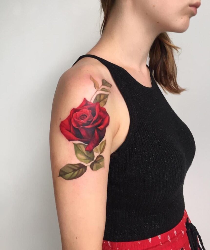 Colorful rose tattoo on the shoulder for women