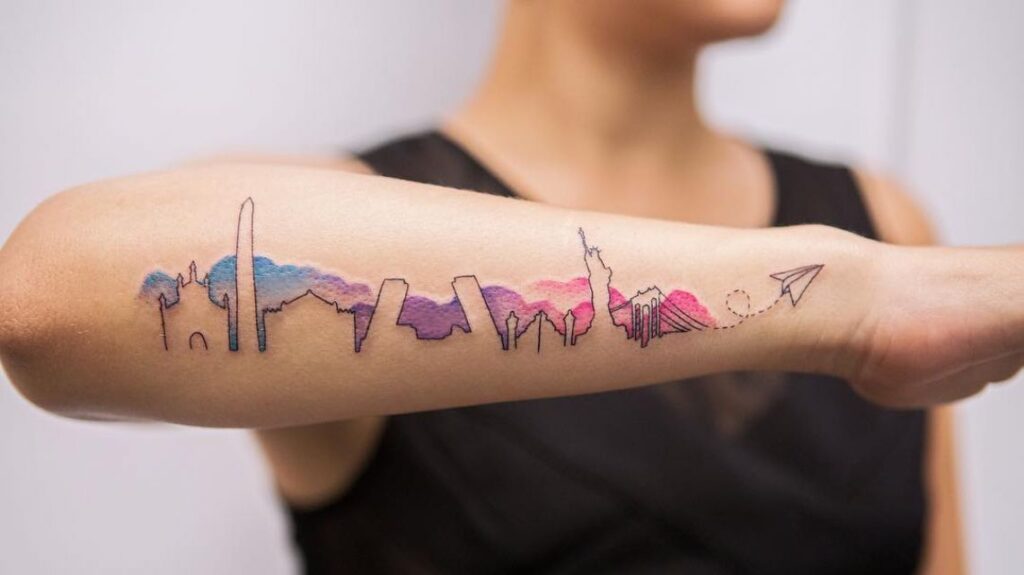 Color city tattoo on the forearm for women