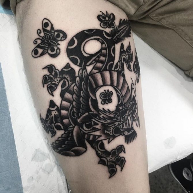 Black&grey dragon tattoo on the thigh for men Black&grey dragon tattoo on the thigh for men