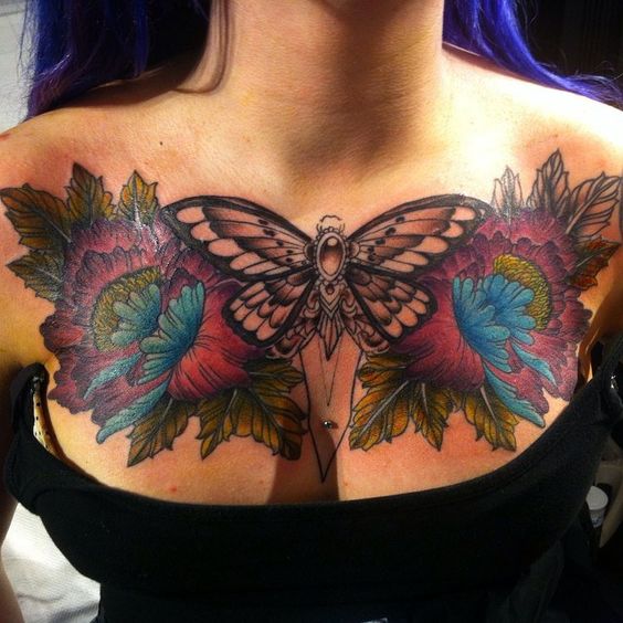 Butterfly tattoo on the chest for women