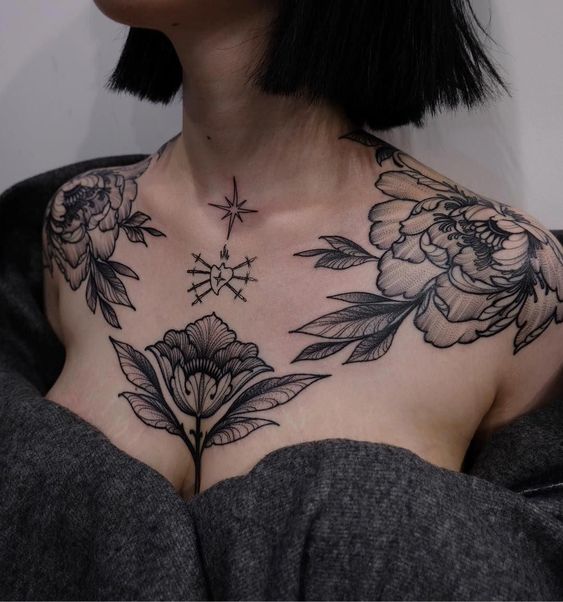 Flower tattoo on the chest for women