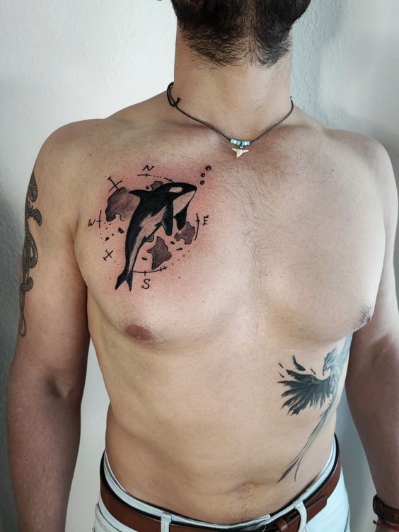 Dolphin tattoo on the chest for men