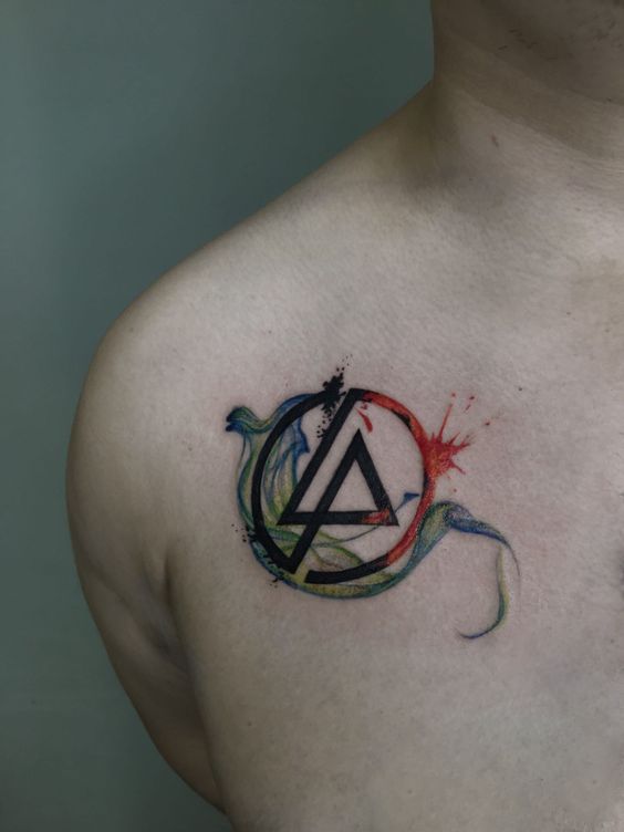 Colorful symbol tattoo on the chest for men