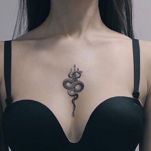 Snake tattoo on the chest for women