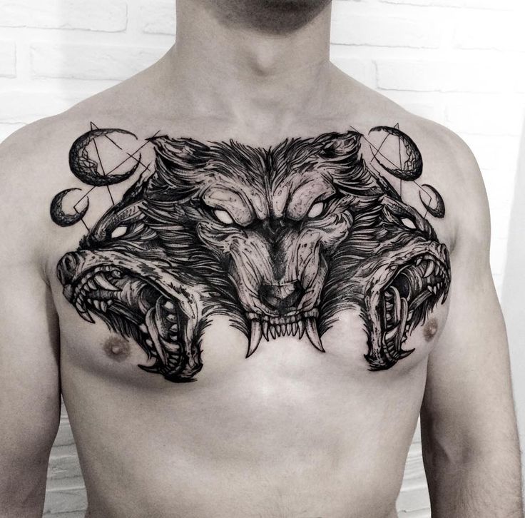 Large graphic style chest tattoo for men