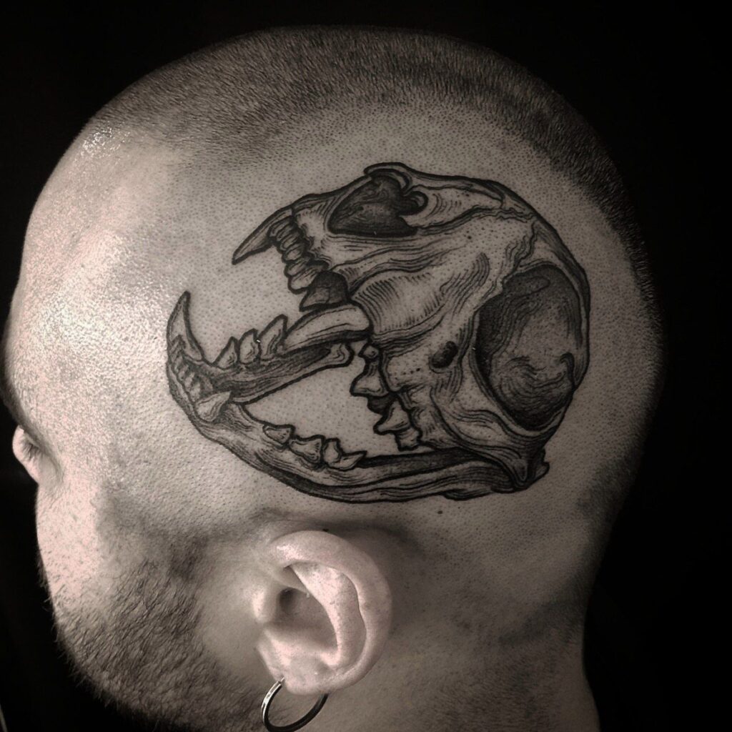 Graphic style tattoo on the head for men