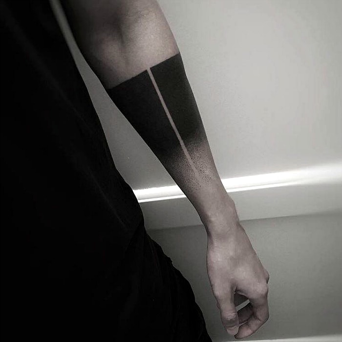 Blackwork tattoo on the forearm for men