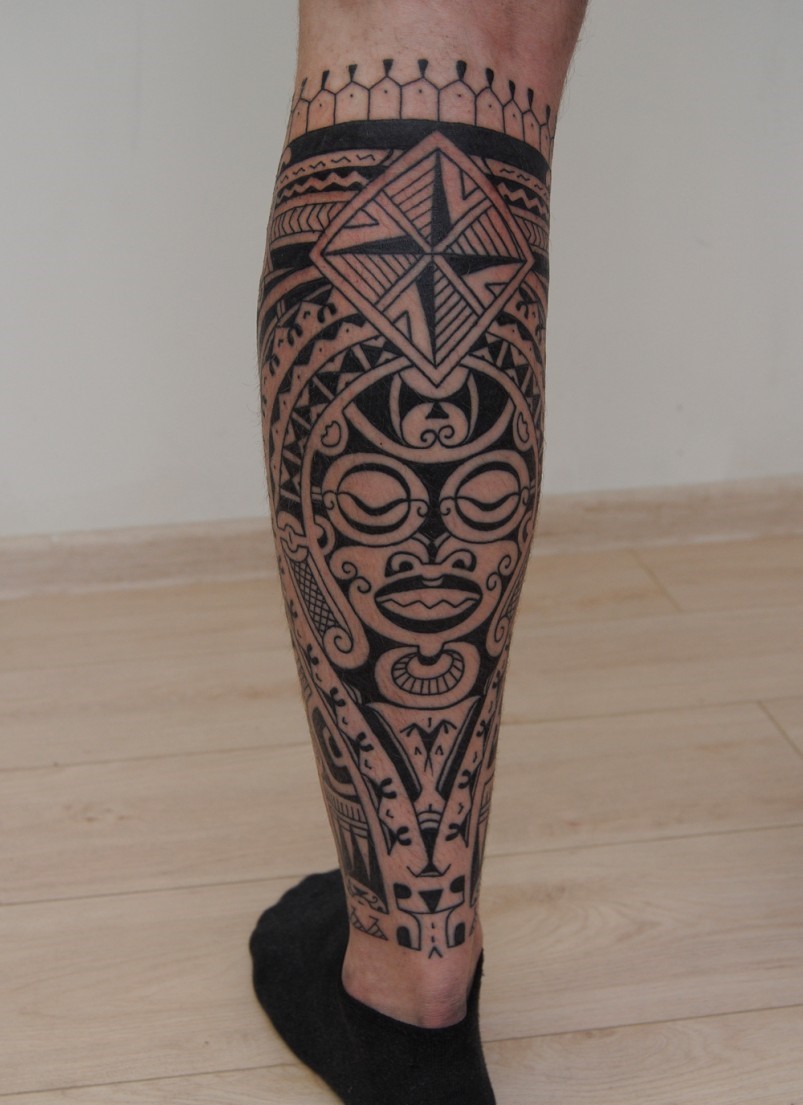 Large tattoo on the calf for men