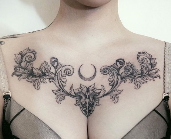 Baroque tattoo on the chest for women