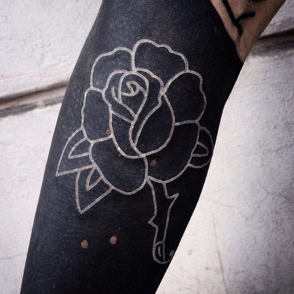 Blackwork tattoo on the forearm for men