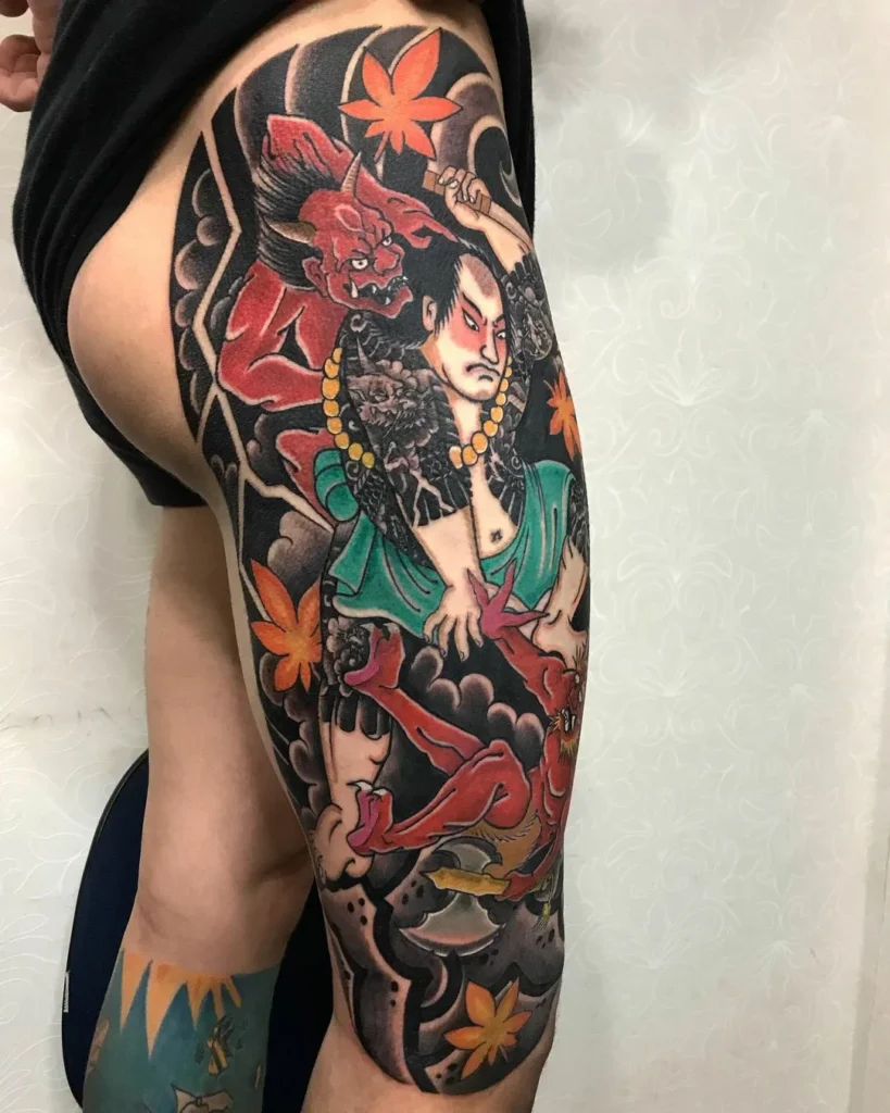 Color tattoo on the thigh for women