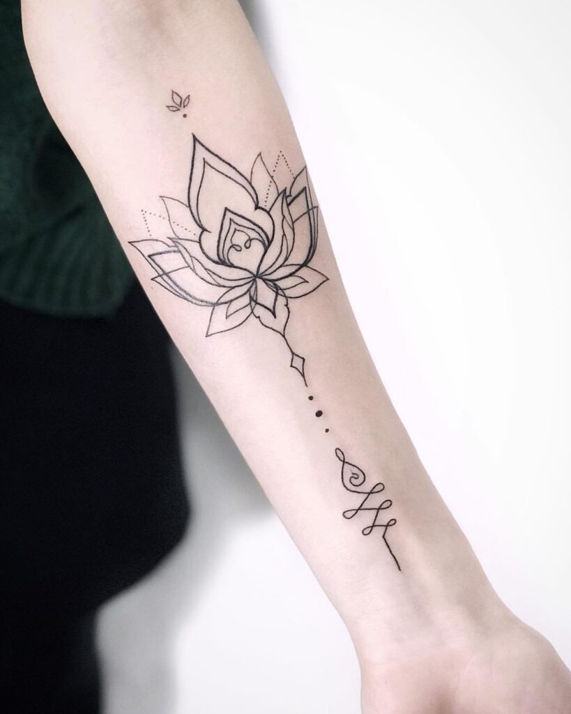 Rose tattoo on the arm for women