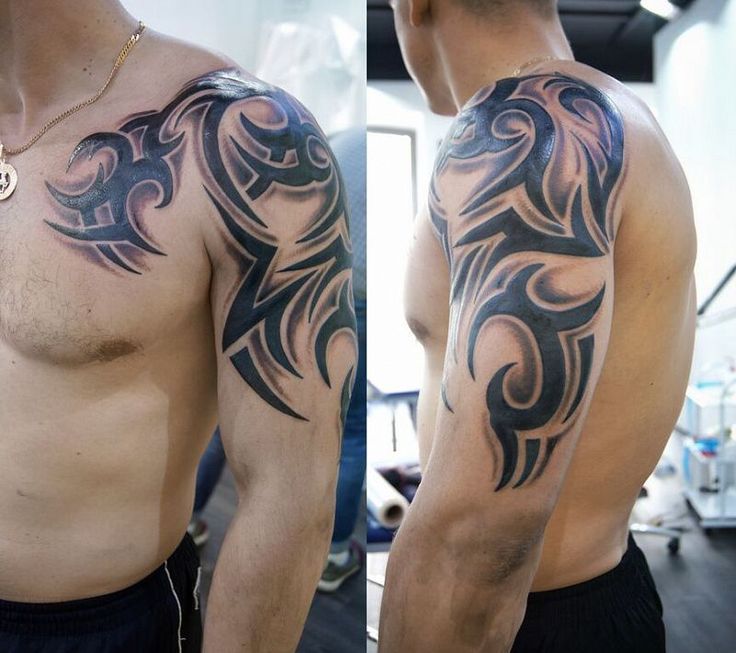 Tribal style tattoo on the shoulder for men