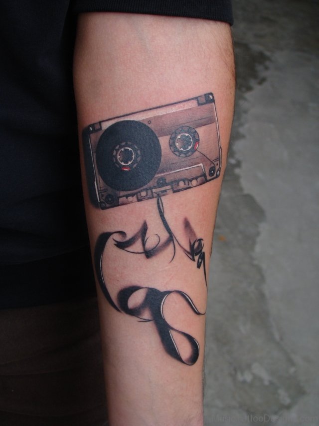 Cassette tape tattoo on the arm for men