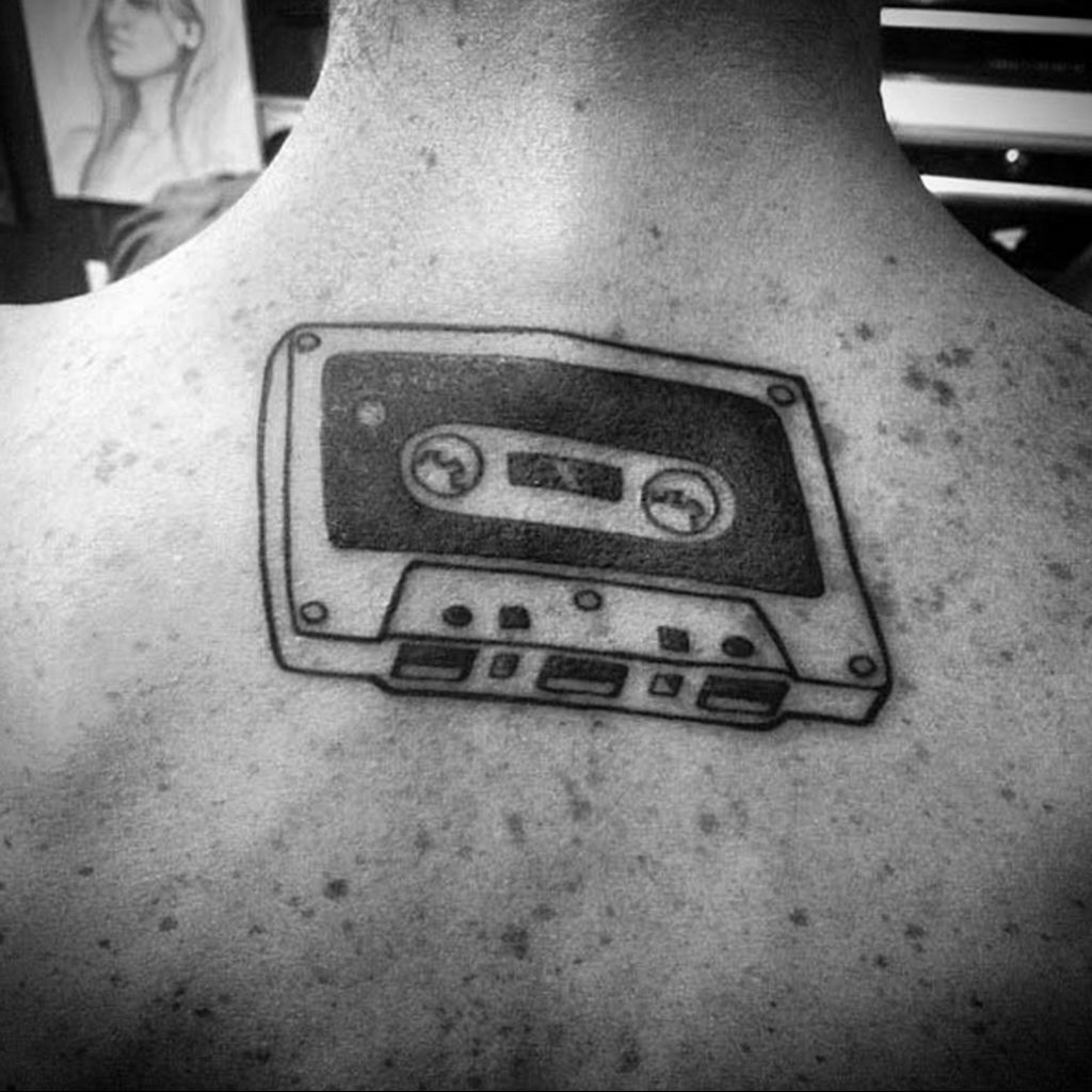 Cassette tape tattoo on the back for men