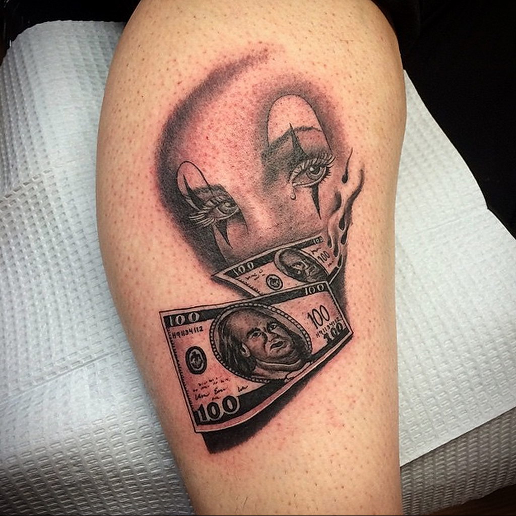 Money tattoo on shin for men