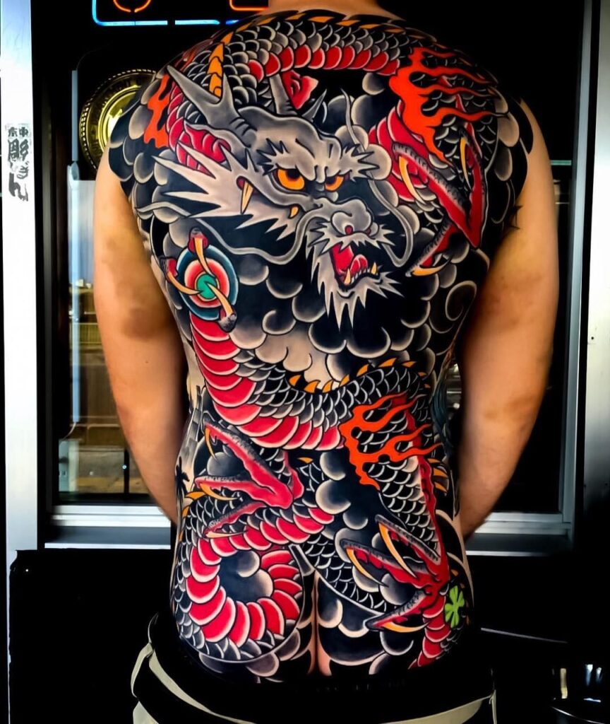 Large Japan style tattoo on the back for men