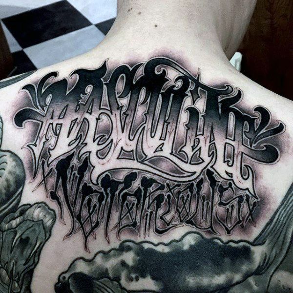 Lettering style tattoos on the back for men