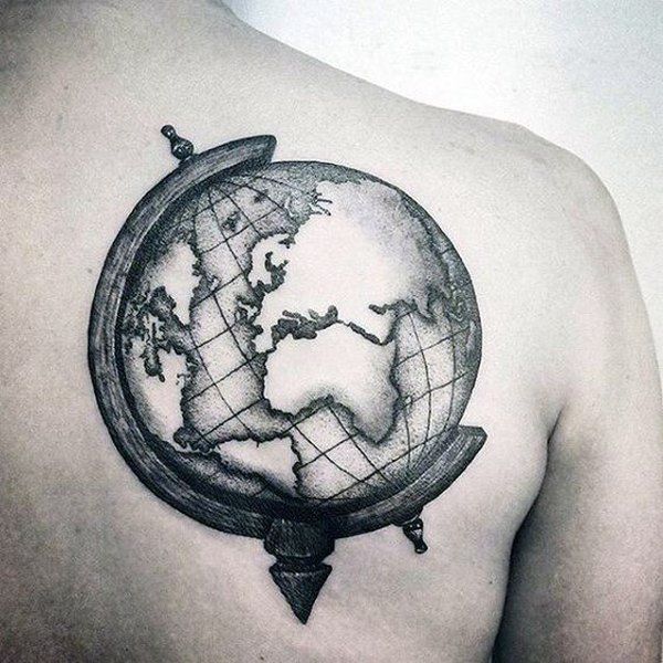 Globe tattoo on the shoulder blade for men