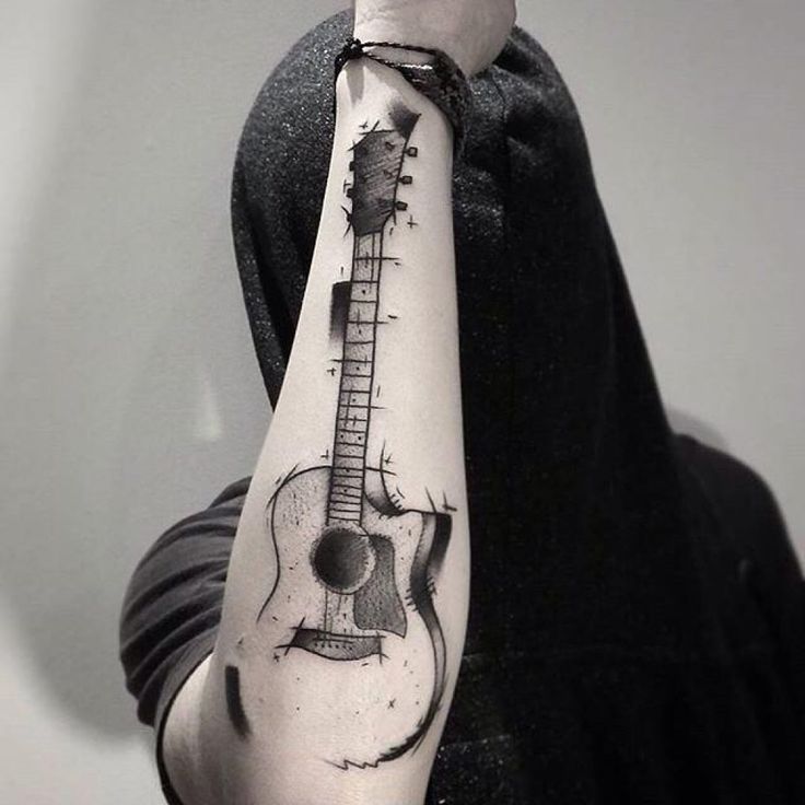 Guitar tattoo on forearm for men