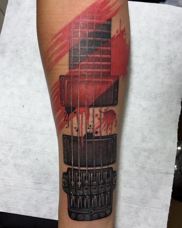 Guitar tattoo on forearm for men