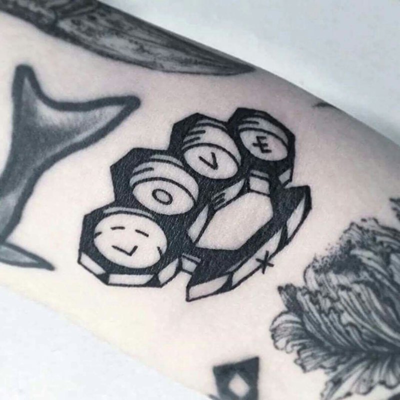 Knuckles tattoo on leg for men