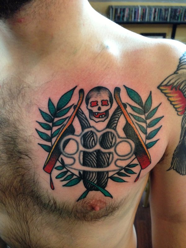 Knuckles tattoo on chest for men