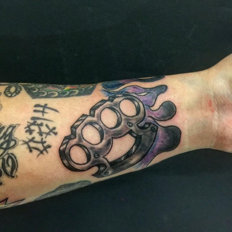 Knuckles tattoo on forearm for men