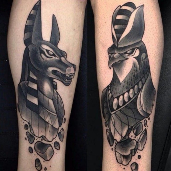 Anubis tattoo on the shin for women