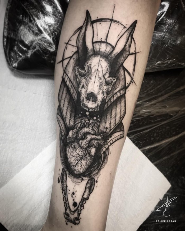 Anubis tattoo on forearm for men