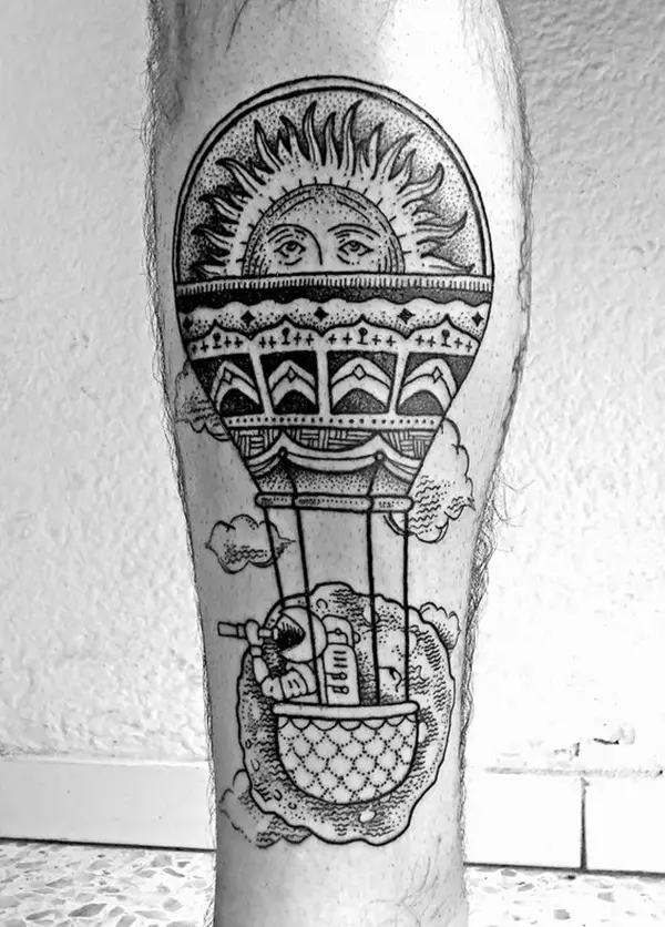 Balloon tattoo on shin for men