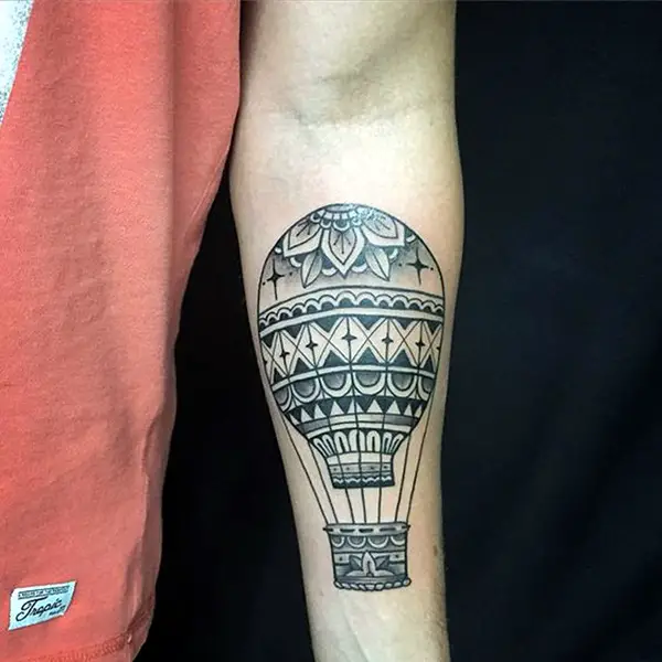 Balloon tattoo on forearm for men