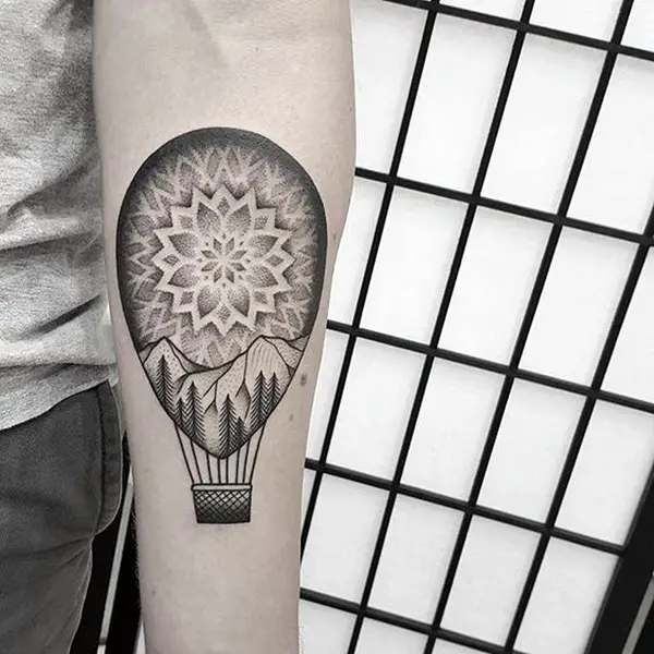 Balloon tattoo on forearm for men