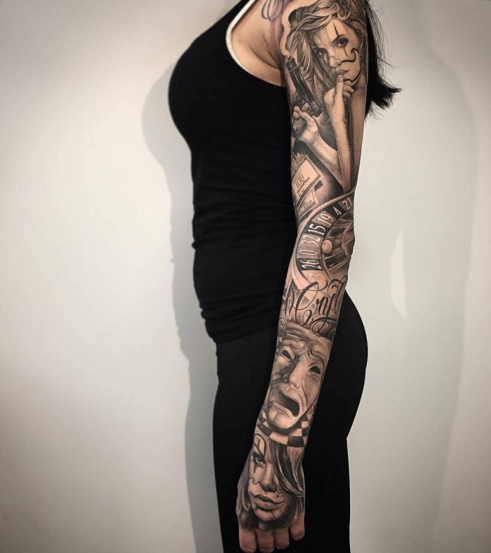 Chicano style tattoo on the arm for women