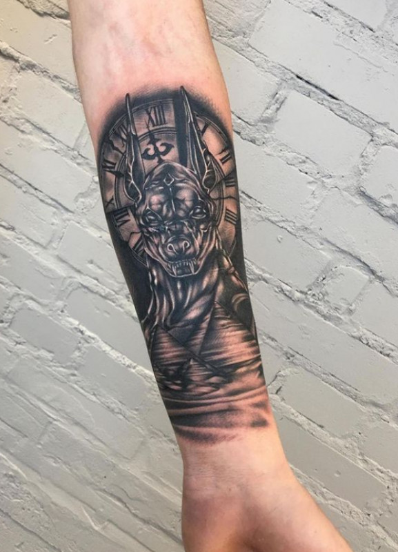 Anubis tattoo on forearm for men