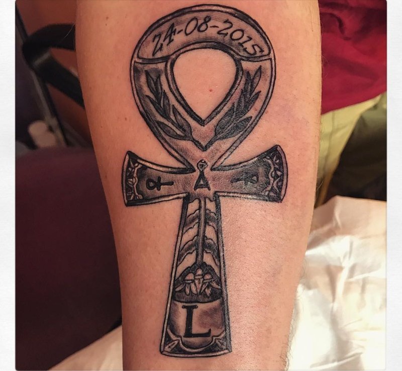 Ankh tattoo on forearm for men