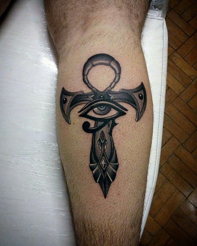 Ankh tattoo on the calf for men