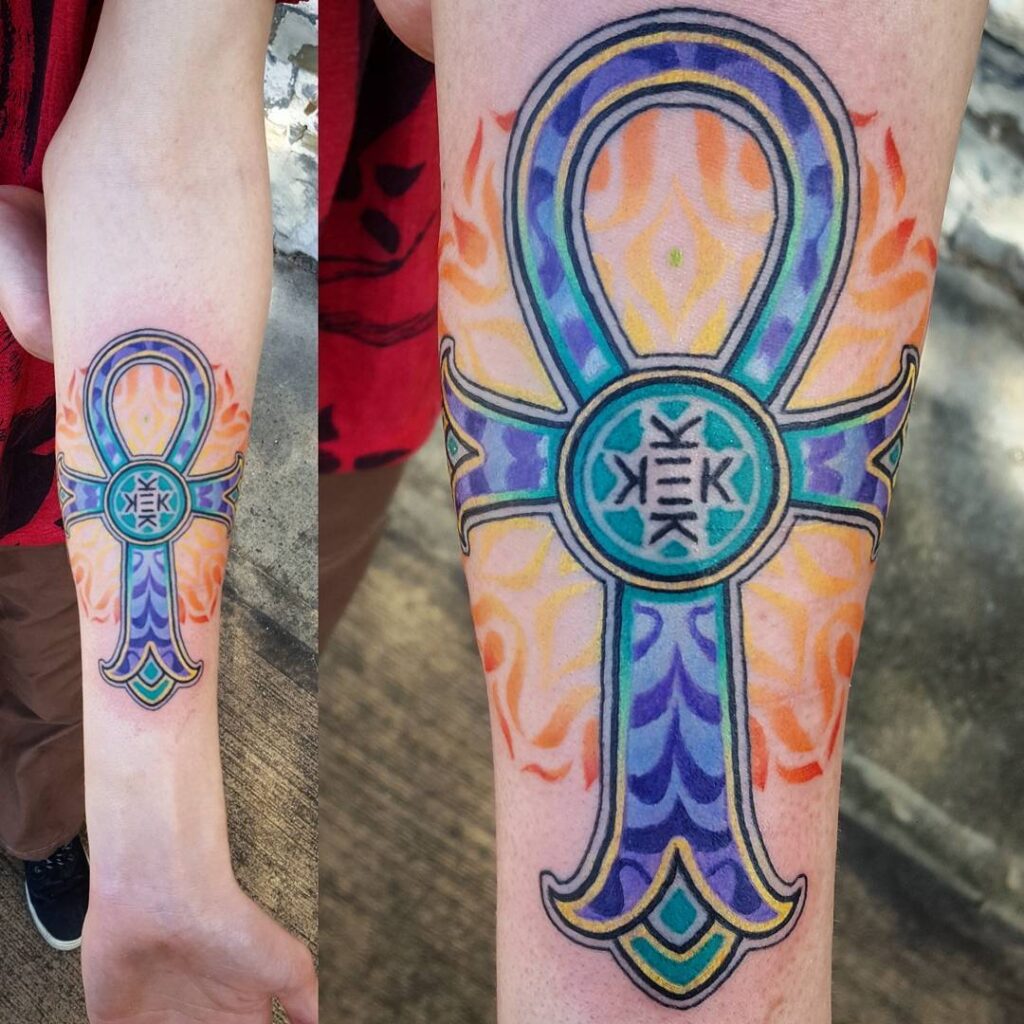 Colorful ankh tattoo on forearm for women