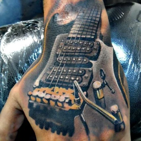 Guitar tattoo on brush for men