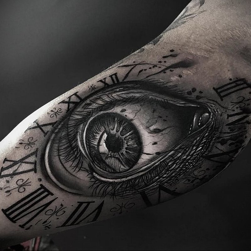 Eye tattoo on bicep for men