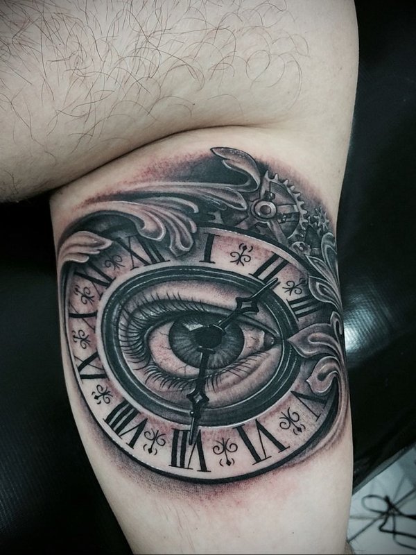 Eye tattoo on bicep for men