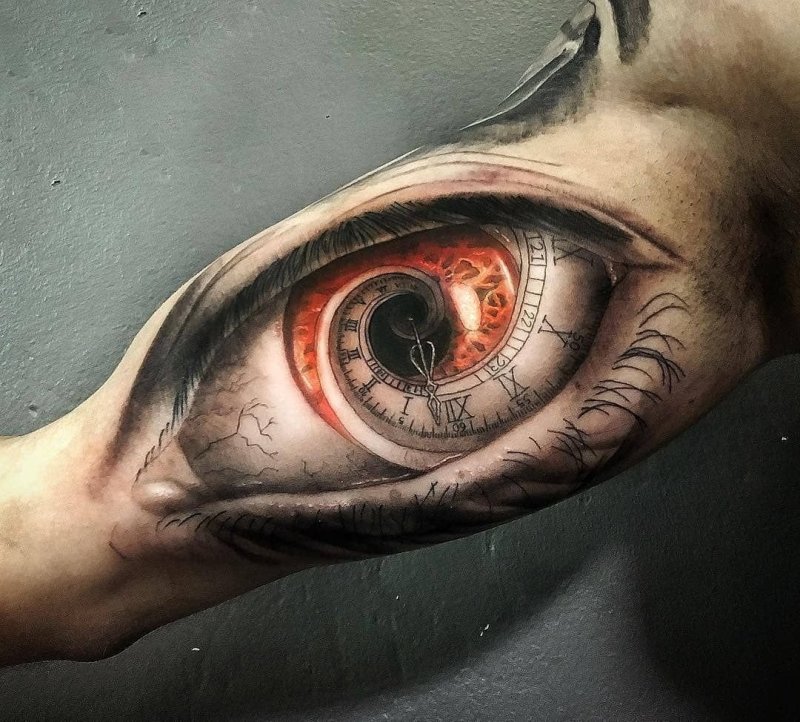 Eye tattoo on bicep for men