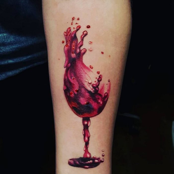 Wine tattoo on forearm for men